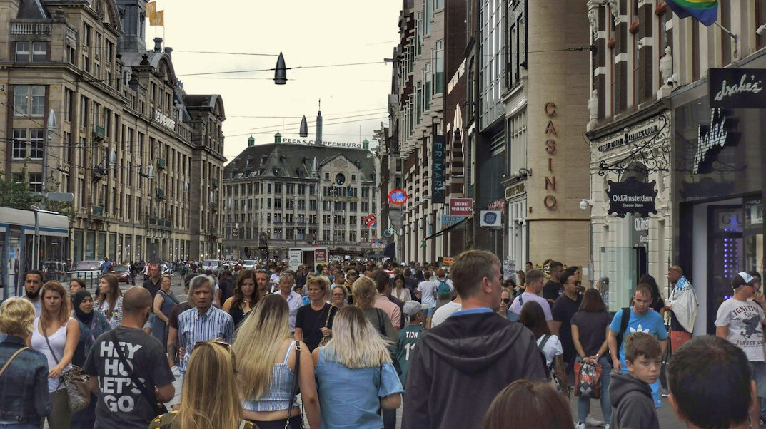Busy Danish city street with people going about their day